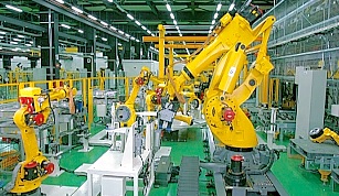 本社ロボット工場。自社の知能ロボットを多数用いた自動組立システムにより組み立てられたロボットは、試験スペースで自動試験と検査が行われる。